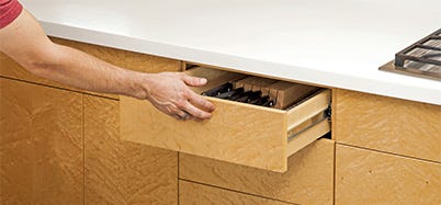 Drawer with no handle or pull that must be pushed to be opened