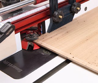 Raised panel router bit and insert installed on router table