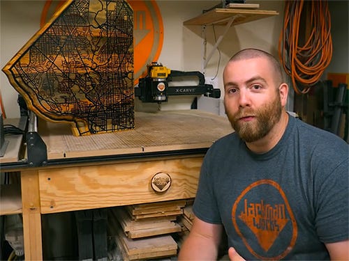 Paul Jackman shows off his epoxy inlaid road map