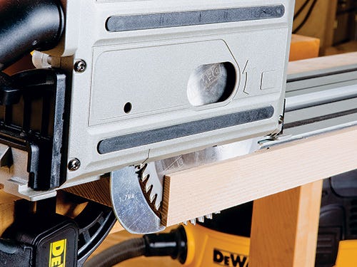 Close-up view of dewalt track saw equipped with a riving knife