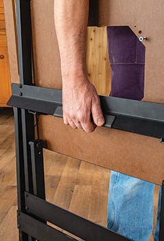 Rock-steady folding table carrying handle