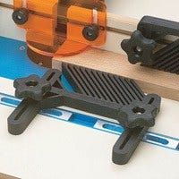 Featherboard guide for a router table