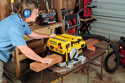 Smoothing rough cut lumber with a benchtop planer