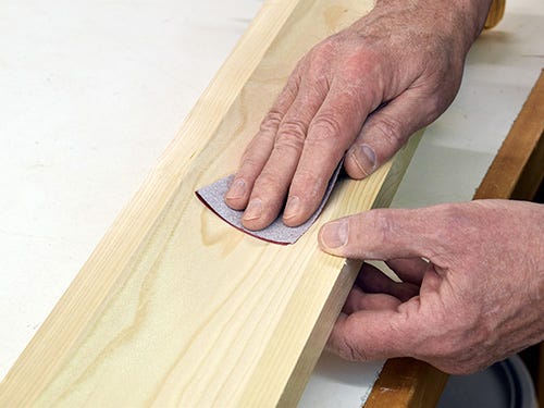 Smoothing cove cut with sandpaper sheet