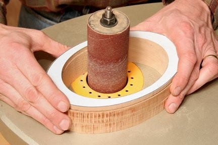 Sanding the interior of keepsake box with an oscillating sander