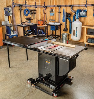 Jet table saw in the center of garage workshop