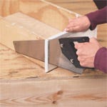 Using hand saw to trim custom drawer front to size