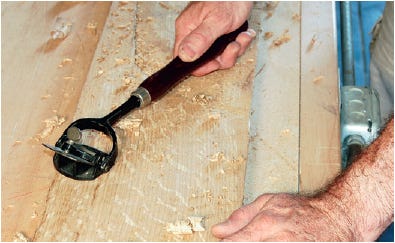 Smoothing roughsawn boards with box scraper