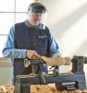 Man On The Lathe Wearing Face Shield