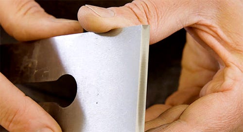 holding a sharp hand plane iron