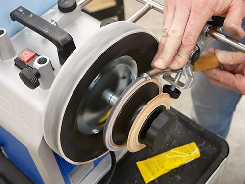 Tormek grinding wheel sharpening a turning gouge