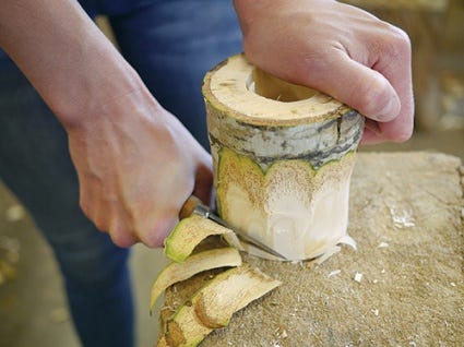 Using a carving knife to debark a box blank