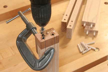 Using shop made jig to drill dowel holes
