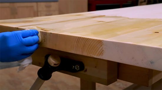 applying finish to table top