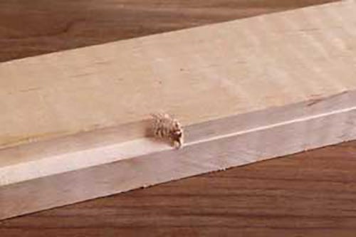 Using a router to smooth out a splintered rabbet cut