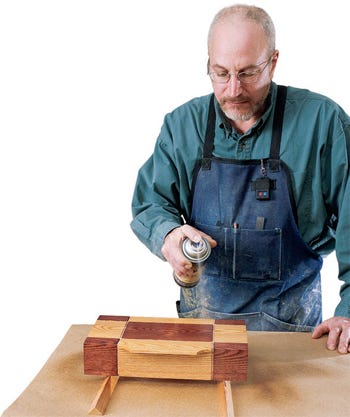 Sealing stain finish with a spray lacquer