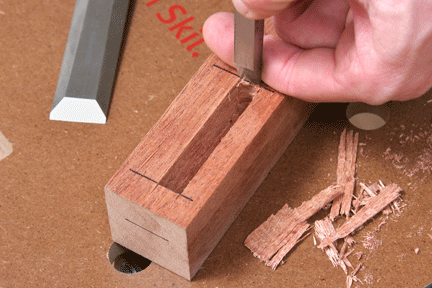 Chiseling out end of mortise joint