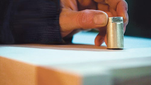 Checking fit of brass pins in bench dog holes