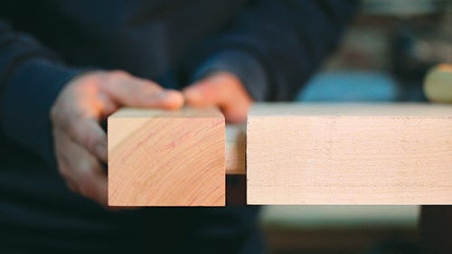 Placing end cap on breadboard joint of mini workbench