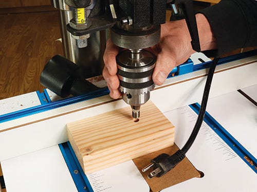Installing a threaded insert with a drill press