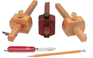 Knives, marking gauges and pencils used fro marking woodworking projects