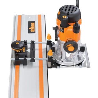 Router clampted to triton track saw track