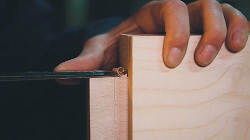 Cleaning up breadboard tenon with chisel