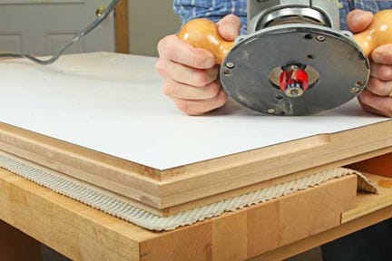 Trimming table edging tongue with rabbeting bit
