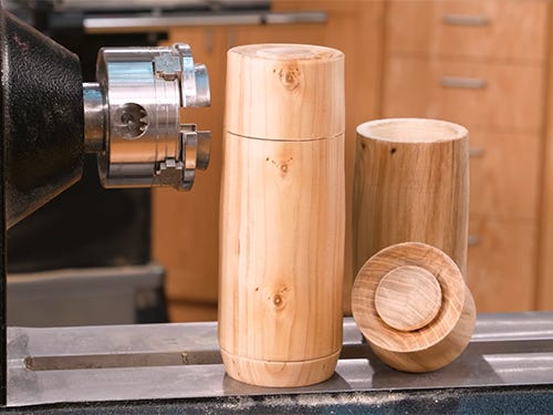 Turned canister made with green wood and matching lid