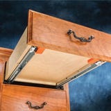 Bottom view of a drawer installed with undermount drawer slides