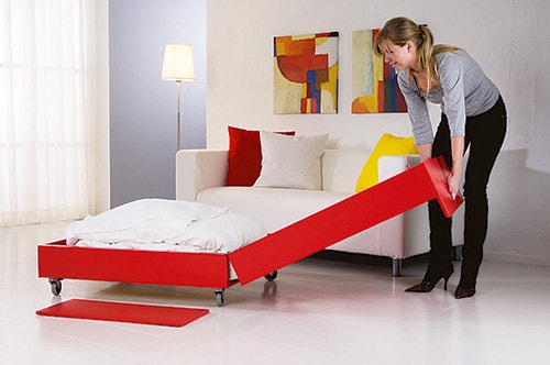 Opened convertible coffee table as a bed