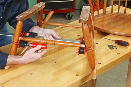 Gluing up a chair stretcher with bar clamps