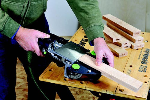 Festool Domino tool cutting slots for rail joinery