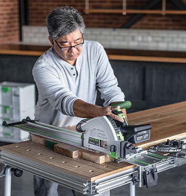 Cutting lumber with a track saw