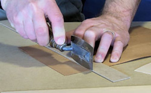 Using ruler to guide veneering cut