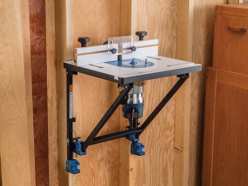 Rockler convertible router table mounted for use on a workshop wall