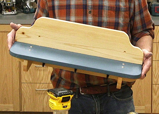 wall shelf with coat hooks