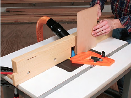 Cutting panel at router table with shop-made fence