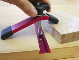 t track hold down
