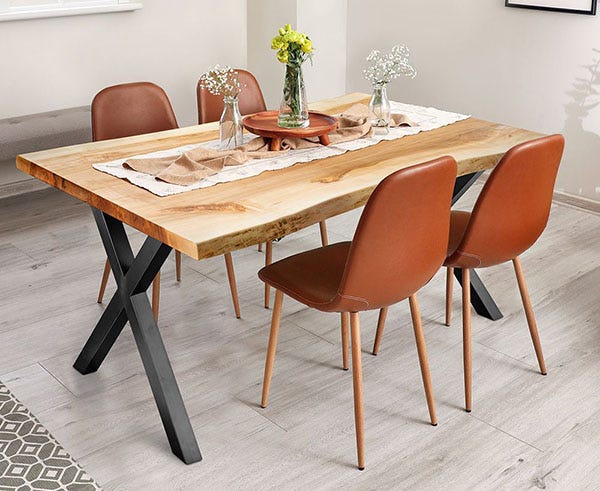 x-style metal legs attached to dining table