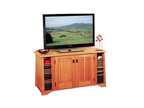 Entertainment center with side disc storage and cabinet