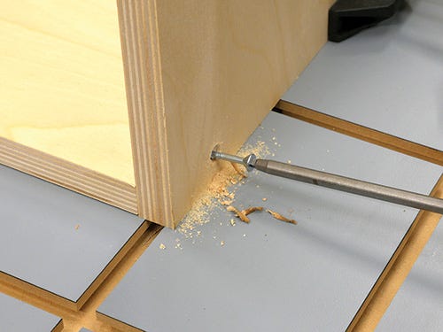 Securing a casework butt joint with a metal bolt