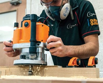 man using a triton router