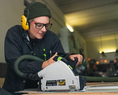 Man operating a joinery jig