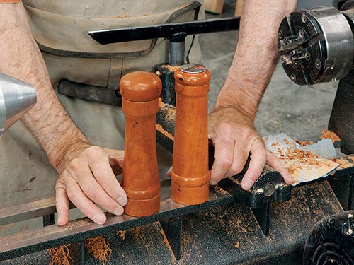 Turned salt and pepper shakers finished with shellac